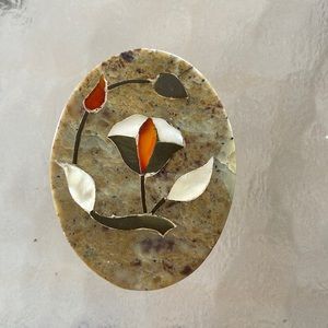 Marble oval box with inlaid design on cover. Made in India